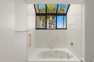 Start your day with glowing sunrise views across Sarasota Bay on Longboat Key Golf Club Resort in Florida - for sale on GolfHomes.com, golf home, golf lot