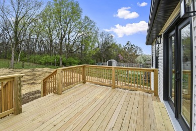 This stunning new home combines quality craftsmanship with on Bill and Payne Stewart Golf Course  in Missouri - for sale on GolfHomes.com, golf home, golf lot