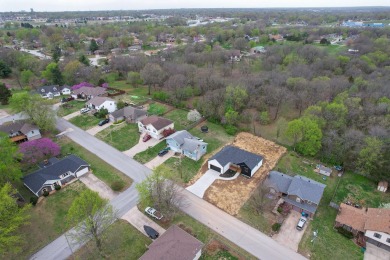 This stunning new home combines quality craftsmanship with on Bill and Payne Stewart Golf Course  in Missouri - for sale on GolfHomes.com, golf home, golf lot