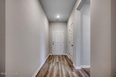 Welcome to your dream home! This stunning 3-bedroom, 2-bathroom on Brunswick Plantation and Golf Resorts in North Carolina - for sale on GolfHomes.com, golf home, golf lot