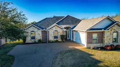 Stunning Custom Home in North Shore Gated Community with Pond on The Lake Country Club - Lake Waco in Texas - for sale on GolfHomes.com, golf home, golf lot