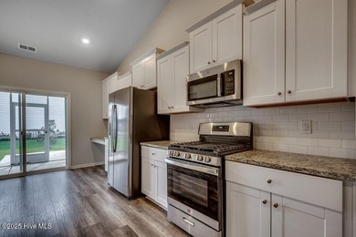 Welcome to your dream home! This stunning 3-bedroom, 2-bathroom on Brunswick Plantation and Golf Resorts in North Carolina - for sale on GolfHomes.com, golf home, golf lot