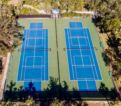 Start your day with glowing sunrise views across Sarasota Bay on Longboat Key Golf Club Resort in Florida - for sale on GolfHomes.com, golf home, golf lot