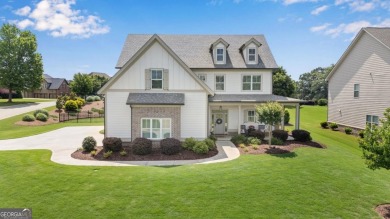 Must see this stunning, well maintained 5 bedroom , 3 1/2 bath on Traditions of Braselton Golf Club in Georgia - for sale on GolfHomes.com, golf home, golf lot