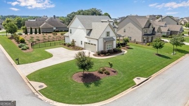 Must see this stunning, well maintained 5 bedroom , 3 1/2 bath on Traditions of Braselton Golf Club in Georgia - for sale on GolfHomes.com, golf home, golf lot
