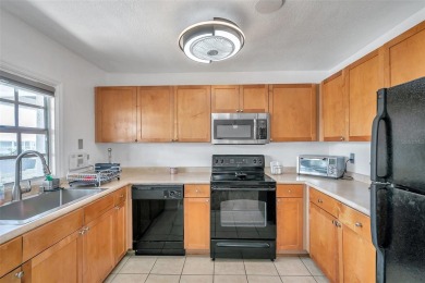 *Live the dream with this incredible 2nd-floor condo that comes on St. Petersburg Country Club in Florida - for sale on GolfHomes.com, golf home, golf lot