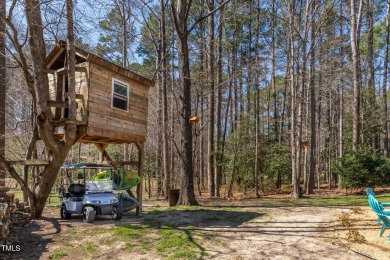 A MUST SEE! Charming 2-Bedroom, 2-Bathroom Cottage in the Gated on River Golf and County Club at Lake Royale in North Carolina - for sale on GolfHomes.com, golf home, golf lot