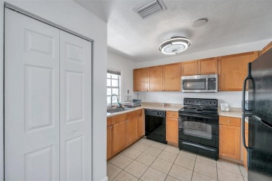 *Live the dream with this incredible 2nd-floor condo that comes on St. Petersburg Country Club in Florida - for sale on GolfHomes.com, golf home, golf lot