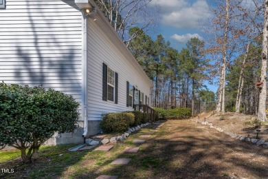 A MUST SEE! Charming 2-Bedroom, 2-Bathroom Cottage in the Gated on River Golf and County Club at Lake Royale in North Carolina - for sale on GolfHomes.com, golf home, golf lot