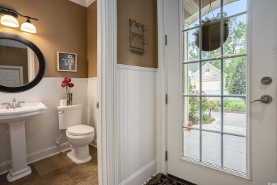 This custom-built 4-bedroom, 4.5-bathroom home sits on a corner on Long Bay Club in South Carolina - for sale on GolfHomes.com, golf home, golf lot