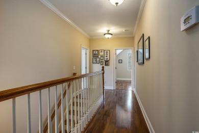 This custom-built 4-bedroom, 4.5-bathroom home sits on a corner on Long Bay Club in South Carolina - for sale on GolfHomes.com, golf home, golf lot