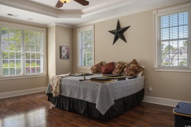 This custom-built 4-bedroom, 4.5-bathroom home sits on a corner on Long Bay Club in South Carolina - for sale on GolfHomes.com, golf home, golf lot