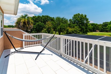 This immaculately maintained, custom-built home overlooks the on Shalimar Pointe Golf and Country Club in Florida - for sale on GolfHomes.com, golf home, golf lot