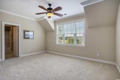 This custom-built 4-bedroom, 4.5-bathroom home sits on a corner on Long Bay Club in South Carolina - for sale on GolfHomes.com, golf home, golf lot