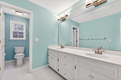 Located in an exclusive, gated golf community, this home sits on on Coosaw Creek Country Club in South Carolina - for sale on GolfHomes.com, golf home, golf lot