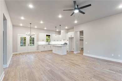 Looking for new construction on a flat lot in Bella Vista? on Bella Vista Country Club - Highlands in Arkansas - for sale on GolfHomes.com, golf home, golf lot