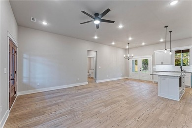 Looking for new construction on a flat lot in Bella Vista? on Bella Vista Country Club - Highlands in Arkansas - for sale on GolfHomes.com, golf home, golf lot