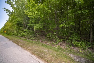 Nearly 3 acres of level meadow and gently rolling hills on Champion Hill Golf Club in Michigan - for sale on GolfHomes.com, golf home, golf lot