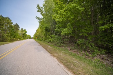 Nearly 3 acres of level meadow and gently rolling hills on Champion Hill Golf Club in Michigan - for sale on GolfHomes.com, golf home, golf lot