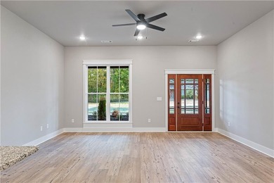 Looking for new construction on a flat lot in Bella Vista? on Bella Vista Country Club - Highlands in Arkansas - for sale on GolfHomes.com, golf home, golf lot