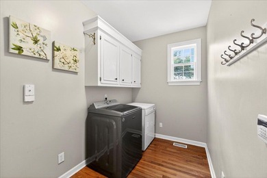 Located in an exclusive, gated golf community, this home sits on on Coosaw Creek Country Club in South Carolina - for sale on GolfHomes.com, golf home, golf lot