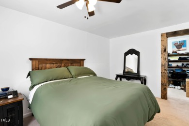 A MUST SEE! Charming 2-Bedroom, 2-Bathroom Cottage in the Gated on River Golf and County Club at Lake Royale in North Carolina - for sale on GolfHomes.com, golf home, golf lot