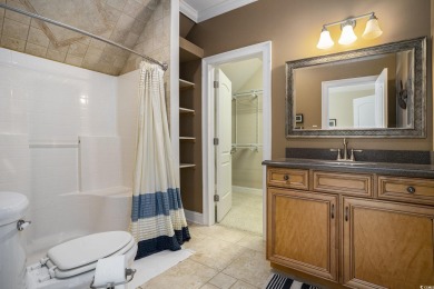 This custom-built 4-bedroom, 4.5-bathroom home sits on a corner on Long Bay Club in South Carolina - for sale on GolfHomes.com, golf home, golf lot