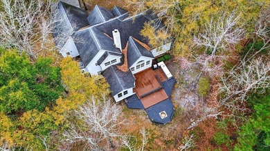 Located in an exclusive, gated golf community, this home sits on on Coosaw Creek Country Club in South Carolina - for sale on GolfHomes.com, golf home, golf lot