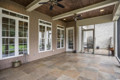 This custom-built 4-bedroom, 4.5-bathroom home sits on a corner on Long Bay Club in South Carolina - for sale on GolfHomes.com, golf home, golf lot