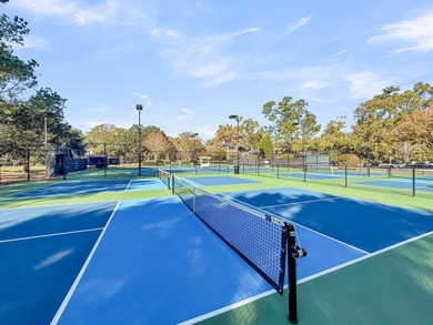 Located in an exclusive, gated golf community, this home sits on on Coosaw Creek Country Club in South Carolina - for sale on GolfHomes.com, golf home, golf lot