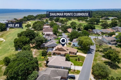 This immaculately maintained, custom-built home overlooks the on Shalimar Pointe Golf and Country Club in Florida - for sale on GolfHomes.com, golf home, golf lot