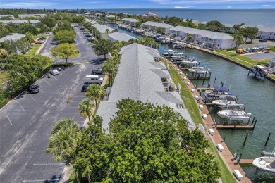 *Live the dream with this incredible 2nd-floor condo that comes on St. Petersburg Country Club in Florida - for sale on GolfHomes.com, golf home, golf lot