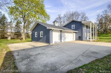 Nestled on an amazing nearly one-acre lot, this beautifully on Prairie Creek Golf Course in Michigan - for sale on GolfHomes.com, golf home, golf lot