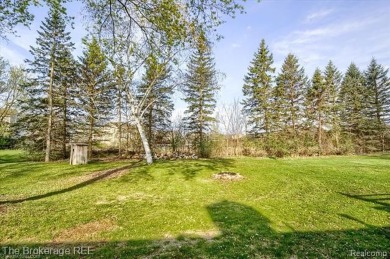Nestled on an amazing nearly one-acre lot, this beautifully on Prairie Creek Golf Course in Michigan - for sale on GolfHomes.com, golf home, golf lot