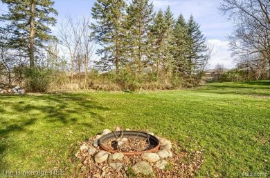 Nestled on an amazing nearly one-acre lot, this beautifully on Prairie Creek Golf Course in Michigan - for sale on GolfHomes.com, golf home, golf lot