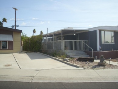 This 1970 Manufactured home is. 2-bedroom 2 bath. Sold turnkey on The Club At Shenandoah Springs in California - for sale on GolfHomes.com, golf home, golf lot
