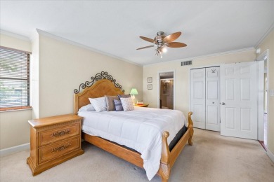 This second floor corner unit is in a gated community on Feather Sound Country Club in Florida - for sale on GolfHomes.com, golf home, golf lot