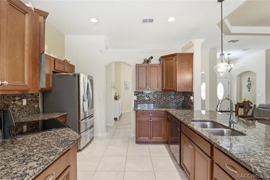 Experience a high-performance retreat in this 2018-built on Pine Ridge Community Golf and Country Club in Florida - for sale on GolfHomes.com, golf home, golf lot