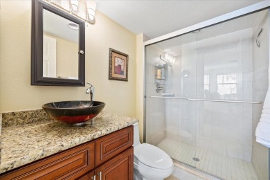 This second floor corner unit is in a gated community on Feather Sound Country Club in Florida - for sale on GolfHomes.com, golf home, golf lot