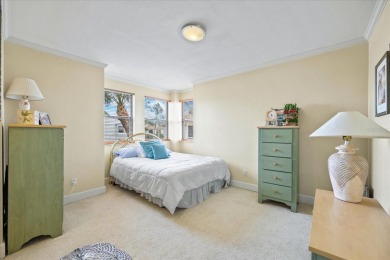 This second floor corner unit is in a gated community on Feather Sound Country Club in Florida - for sale on GolfHomes.com, golf home, golf lot
