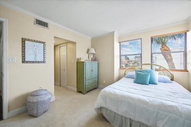 This second floor corner unit is in a gated community on Feather Sound Country Club in Florida - for sale on GolfHomes.com, golf home, golf lot