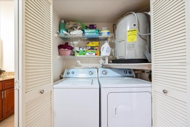 This second floor corner unit is in a gated community on Feather Sound Country Club in Florida - for sale on GolfHomes.com, golf home, golf lot