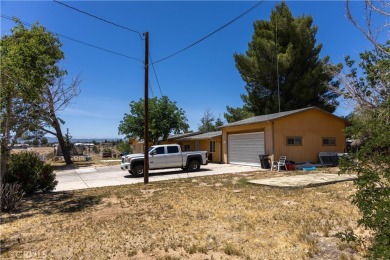 LIVE IN ONE AND RENT THE SECOND UNIT!!   YOU HAVE TO COME TO SEE on Hesperia Golf and Country Club in California - for sale on GolfHomes.com, golf home, golf lot
