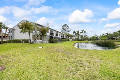 This second floor corner unit is in a gated community on Feather Sound Country Club in Florida - for sale on GolfHomes.com, golf home, golf lot
