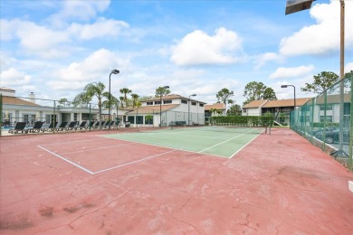 This second floor corner unit is in a gated community on Feather Sound Country Club in Florida - for sale on GolfHomes.com, golf home, golf lot