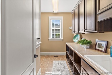 This exquisite custom-built home combines timeless Southern on Anderson Creek Golf Club in North Carolina - for sale on GolfHomes.com, golf home, golf lot