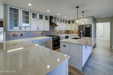 Wake up to sweeping, expansive panoramic views of Tellico Lake on Toqua Golf Course - Loudon County in Tennessee - for sale on GolfHomes.com, golf home, golf lot