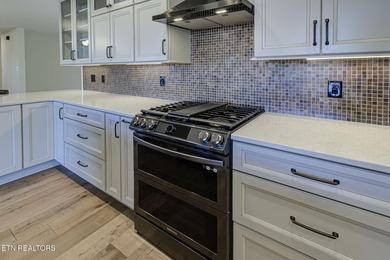 Wake up to sweeping, expansive panoramic views of Tellico Lake on Toqua Golf Course - Loudon County in Tennessee - for sale on GolfHomes.com, golf home, golf lot