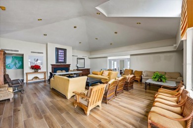 This second floor corner unit is in a gated community on Feather Sound Country Club in Florida - for sale on GolfHomes.com, golf home, golf lot