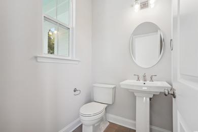 Fall in love with this 3-bedroom, 2.5-bath home in the heart of on Tidewater Golf Club and Plantation in South Carolina - for sale on GolfHomes.com, golf home, golf lot